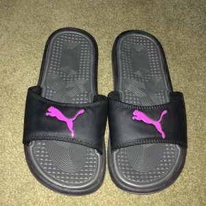 Black and pink puma slides